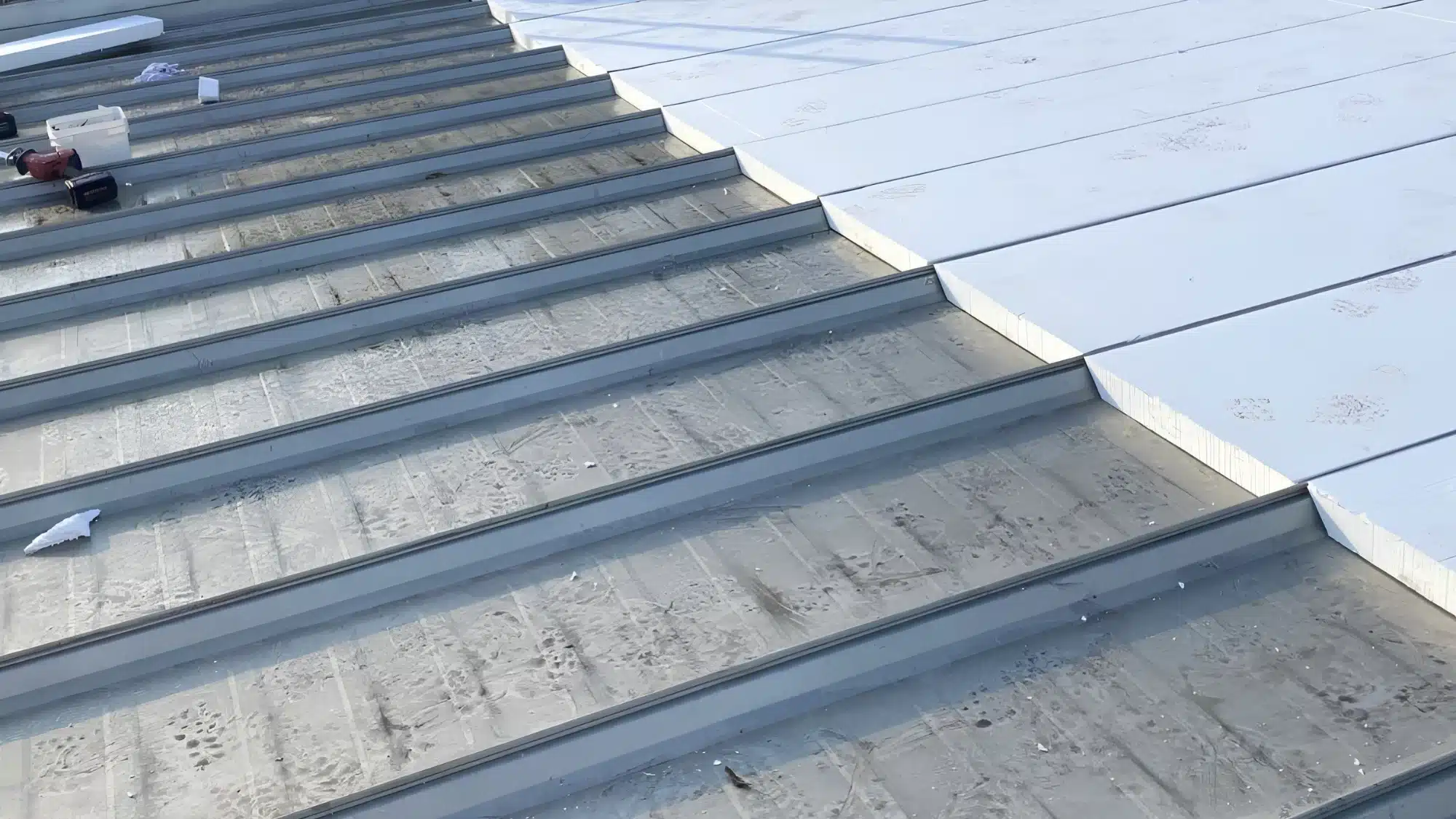 Roofing contractor inspecting a roofing system during preventative maintenance